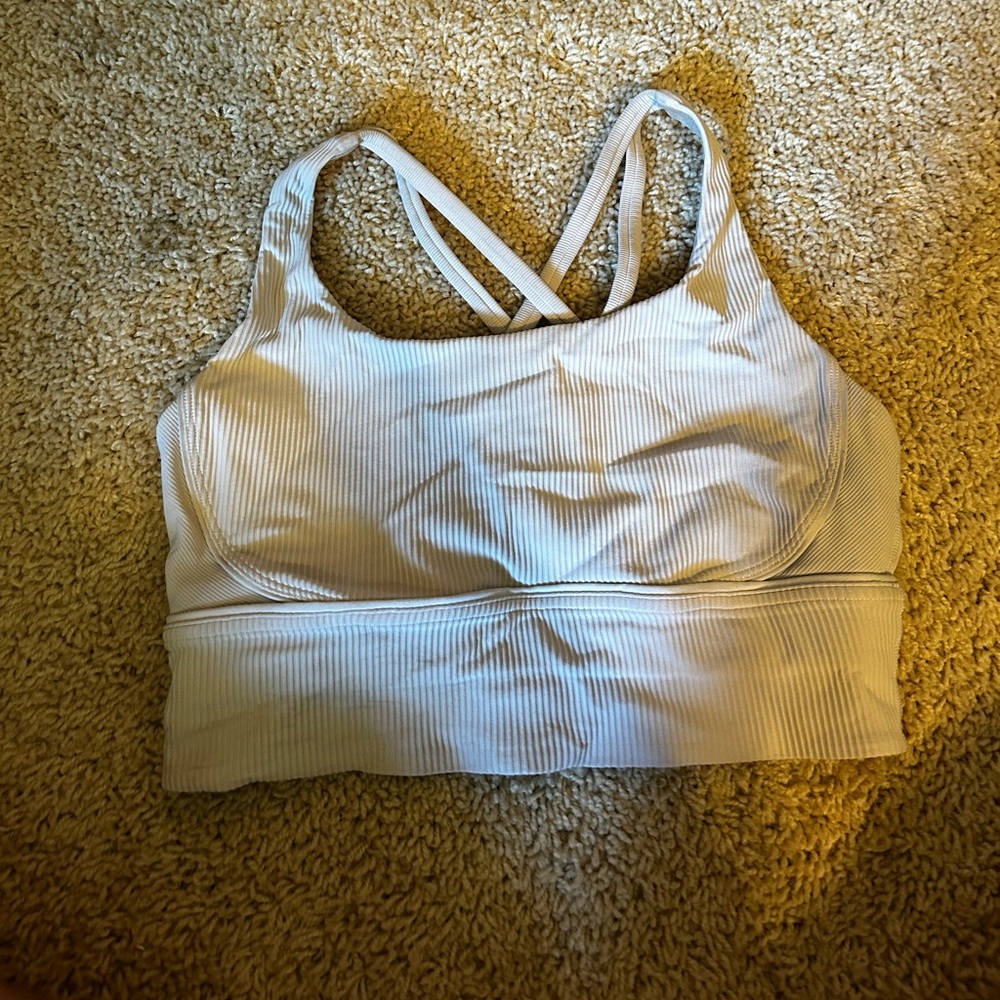 Cream colored sports bra from lululemon.